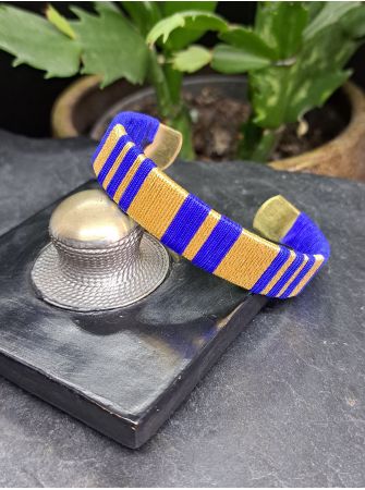 Manchette moyenne bleu roi et doré.