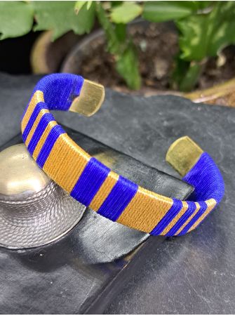 Manchette moyenne bleu roi et doré.