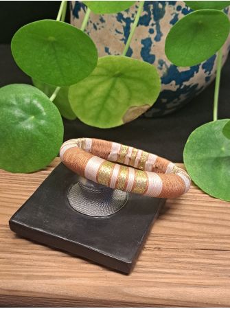 Jonc marron, beige et doré.