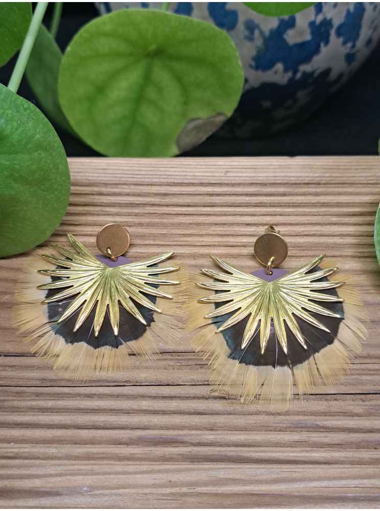 Boucles série plumes et cuir. Boucles série plumes et cuir.